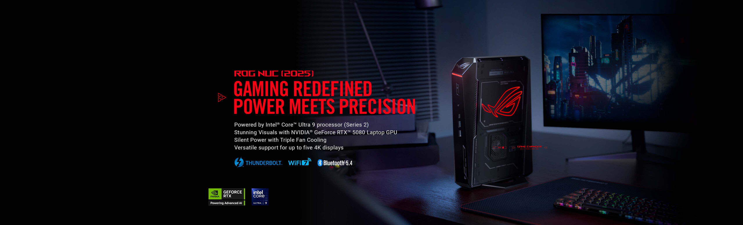 ROG NUC compact gaming PC with monitor and keyboard on desk