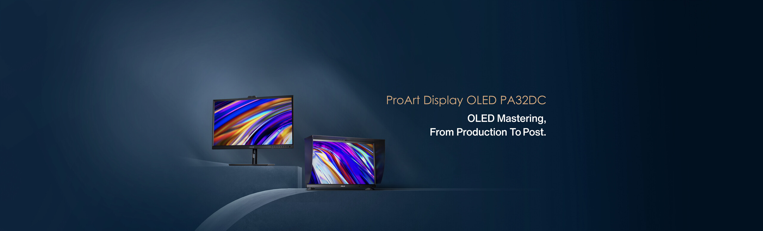 L'immagine mostra due schermi con display OLED con colori vivaci. Accanto è presente il testo ProArt Display OLED PA32DC con il sottotitolo OLED Mastering, From Production To Post.