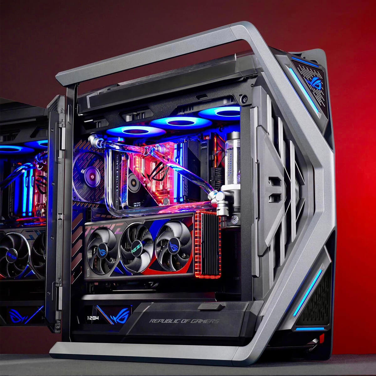 Widok pod kątem – system PC ROG z czerwonym światłem w tle