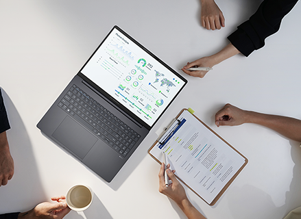 A business woman is presenting to her client by ExpertBook B3 Detachable laptop.